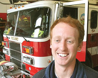 Shaun Serich, 24, oversees the Western Reserve Joint Fire District’s program that pays for volunteers to obtain their paramedic certification at Youngstown State University, including tuition and books. Eight volunteers are participating in the program, which requires them to put in eight hours at the station, maintain a 3.0 grade-point average and have a professional attitude.