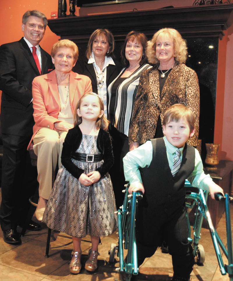 Angels of Easter Seals fashion show promo children are Cyprus Blosser, left, and Larry Smith, both 4. Adults from left are Stan Boney-MC, Jane J. Evans, chrm, Joyce Dowell, chrm, Kathy Carroll, President and Lynn Sahli, chrm.