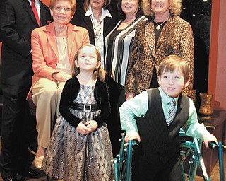 Angels of Easter Seals fashion show promo children are Cyprus Blosser, left, and Larry Smith, both 4. Adults from left are Stan Boney-MC, Jane J. Evans, chrm, Joyce Dowell, chrm, Kathy Carroll, President and Lynn Sahli, chrm.