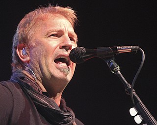 William D. Lewis | The Vindicator .Film star Kevin Costner performs with his band Modern West to a large crowd at Packard Music Hall in Warren 4-22-14.