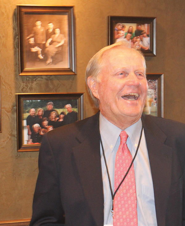 PGA legend Jack Nicklaus shares a lighter moment Wednesday during a dinner at The Lake Club in Poland. Nicklaus and LPGA great Annika Sorenstam were guest speakers at the event, which was a fundraiser for The United Way.