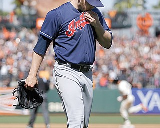 Cleveland Indians’ Cody Allen walks off the field after he gave up the game-winning three run homer in the ninth inning of Sunday’s game in San Francisco. The Giants won, 4-1.