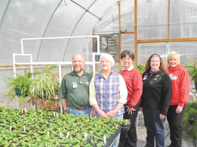 SPECIAL TO THE VINDICATOR
Plans are being made by, from left, Dennis Penner, Sara Scudier, Nancy Mostka, Ellen Speicher and Carol Holt, for the Friends of Fellows Riverside Gardens spring plant sale, which will take place from 10 a.m. to 6 p.m. Friday, 10 a.m. to 3 p.m. Saturday and 11 a.m. to 5 p.m. Sunday. A members preview will be from 4 to 7 p.m. Thursday, when members will receive a 15 percent discount. Members will receive a 10 percent discount other days. Proceeds are used to benefit the gardens, including the new greenhouse.