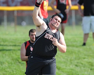 CANFIELD, OHIO - MAY 13, 2014: Jacob Hocevar of Howland throws the shot put during the AAC Red Tier Division track meet at Canfield High School. (Photo by David Dermer/Youngstown Vindicator)