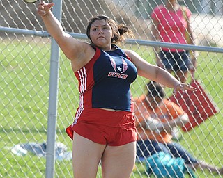 CANFIELD, OHIO - MAY 13, 2014: Gabby Figueroa of Fitch throws the discus during the AAC Red Tier Division track meet at Canfield High School. (Photo by David Dermer/Youngstown Vindicator)