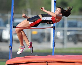 CANFIELD, OHIO - MAY 13, 2014: Lara Quirk of Canfield clears the bar during the girls high jump during the AAC Red Tier Division track meet at Canfield High School. (Photo by David Dermer/Youngstown Vindicator)