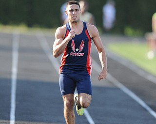 CANFIELD, OHIO - MAY 13, 2014: Nathan Bowlen of Fitch sprints to the finish line during the boys 400 meter dash during the AAC Red Tier Division track meet at Canfield High School. (Photo by David Dermer/Youngstown Vindicator)