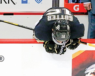The Penguins’ Brandon Sutter hangs his head over the boards as time expires in Game 7 of their Eastern
Conference semifinal game Tuesday against the New York Rangers in Pittsburgh. The Rangers won 2-1 and
took the series, 4-3.