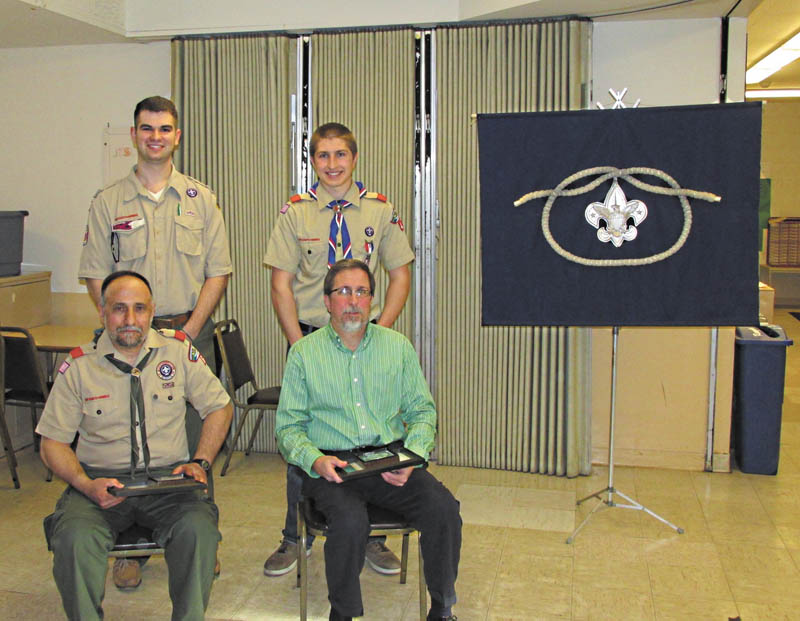 The 2013 Whispering Pines District Award of Merit recipients are, in front from left, Tony Ricciutti and Randy Osiniak, both of Boardman. In the second row are Preston Cockrell and Matthew Osiniak, Randy’s son.