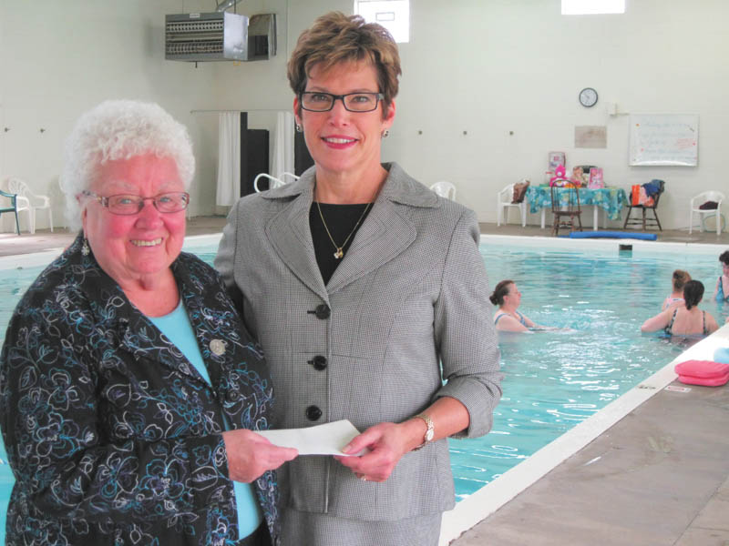 SPECIAL TO THE VINDICATOR 
Ursuline Center receives $20,000 grant for project
The Youngstown Foundation recently awarded the Ursuline Center in Canfield a $20,000 grant for its Motherhouse pool ministry new roof project. Jan Strasfeld, right, executive director of the Youngstown Foundation, presented the check to Sister Nancy Dawson, OSU, general superior of the Ursuline Sisters of Youngstown. The center is the education facility operated by the Ursuline Sisters of Youngstown. The roof project is part of a two-phase renovation that will cost a total of more than $66,000. Donations are welcome for this project and for a new heating project to replace the entire HVAC system for approximately $115,000.