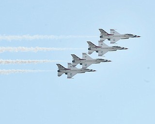 The Air Force Thunderbirds fly in formation during the Thunder Over the Valley Air Show on Sunday at the Youngstown Air Reserve Station. After inclement weather threw a damper on Saturday’s activities, Sunday’s attendance was way up thanks to sunny skies and temperatures in the mid-60s.