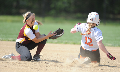 NORTH LIMA, OHIO - MAY 19, 2014: Infielder Stevie Taylor #8 bobbles the ball while trying to tag out a sliding Rhonda Rothacker #12 of Newton Falls as she steals second base in the top of the 3rd inning during a game at South Range High School. (Photo by David Dermer/ Youngstown Vindicator)