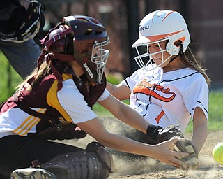 NORTH LIMA, OHIO - MAY 19, 2014: Base runner Alexis Novotny #1 of Newton Falls slides into home plate to score the only Falls run of the game under the tag of catcher Sarah Moretti #11 of South Range in the top of the 5th inning during a game at South Range High School. (Photo by David Dermer/ Youngstown Vindicator)...***Please double check the catcher***