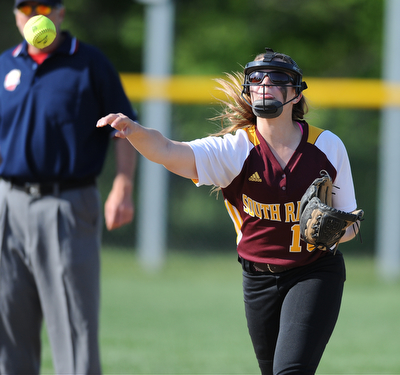 NORTH LIMA, OHIO - MAY 19, 2014: Infielder Lydia Baird #10 of South Range throws the ball to first base for the third out int he top of the 6th inning during a game at South Range High School. (Photo by David Dermer/ Youngstown Vindicator)