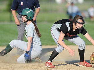 NORTH LIMA, OHIO - MAY 19, 2014: Base runner Makayla Shore #00 slides into second base after a passed ball by Girard and beating the tag of infielder Mel Bakes #4 of Girard during a game at South Range High School. (Photo by David Dermer/ Youngstown Vindicator)