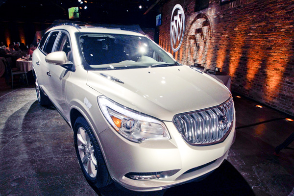The 2013 Buick Enclave is unveiled at a news conference ahead of the New York International Car Show in New York. General Motors announced Tuesday the recall of 2.4 million vehicles in the U.S., including the 2013 Enclave and other full-size crossovers from the 2009-2014 model-years.