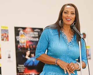 Kathleen Bradley, a Girard native who was a model on “The Price is Right,” was honored with a resolution from
Mayor James Melfi at a luncheon Wednesday. Bradley was in town to promote her recently released memoir,
“Backstage at The Price is Right: Memoirs of a Barker Beauty.”