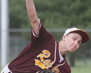 South Range pitcher Greg Dunhan delivers during Wednesday’s Division III district semifinal against Girard at
Cene Park in Struthers. The Raiders battered the Indians, 10-5, to advance to today’s final against Ursuline.