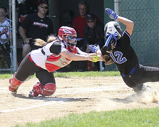 William d Lewis the vindicator  Canfield Catcher Amelia Manenti just misses the tag on Lakeviews Hannah Petrosky(12) during thursday gam atAlliance