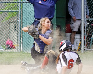 William D Lewis the Vindicator  Canfield's Rebecca Armstrong(6) scores winning run in Thursday victory over Lakeview at Alliance. Lskeview catcher is Samantha Marino(6).