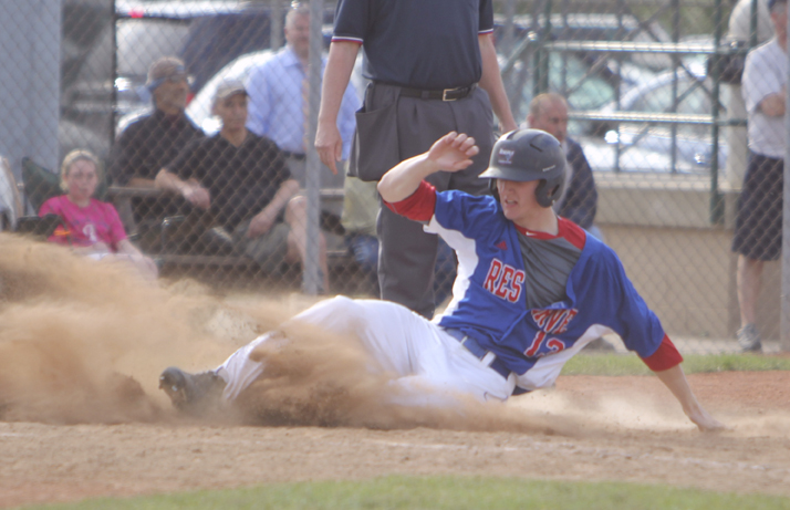 Western Reserve's Jake Clark slides into home for the walk off run during Thursday afternoons matchup against Lowellville. Dustin Livesay  |  The Vindicator  5/22/14  Bob Cene Park.