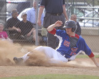 Western Reserve's Jake Clark slides into home for the walk off run during Thursday afternoons matchup against Lowellville. Dustin Livesay  |  The Vindicator  5/22/14  Bob Cene Park.