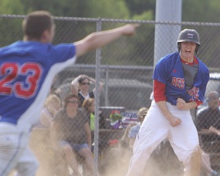 Jake Clark (right) and Parker Clegg (23) celebrate after Clark slides into home for the walk off run during Thursday afternoons matchup against Lowellville. Dustin Livesay  |  The Vindicator  5/22/14  Bob Cene Park.