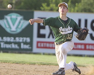 Ursuline's Gianni Quattro throws the ball to first base after making the stop during Thursday evenings matchup against South Range at Bob Cene Park in Struthers.  Dustin Livesay  |  The Vindicator  5/22/14  Struthers.