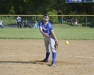 Katie Rickman | The Vindicator.Poland's Kristyn Svetlak (no. 23) pitches during the third inning of the Division II District Final game against Canfield May 23, 2014. Poland won the game 7-6.