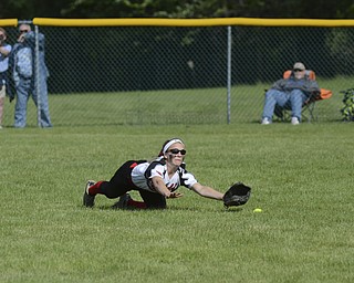 Katie Rickman | The Vindicator.Canfield's Ally Sammarco (no. 5) dives for the ball during the second inning of the Division II Championship game against Poland May 23.
