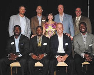 SPECIAL TO THE VINDICATOR
Some of the celebrities who attended last year’s celebrity dinner follow, seated, from left, are Patrick Willis, Mario Manningham, Phil Dawson and Vernon Davis. Standing are Coach Tom Rathman, General Manager Trent Baalke, Denise DeBartolo York, John York and Coach Jim Tomsula.