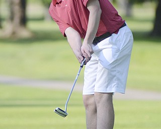 Katie Rickman | The Vindicator.Nick Hough 17, of Boardman putts during the Greatest Golfer Junior Qualifier May 24, 2014.