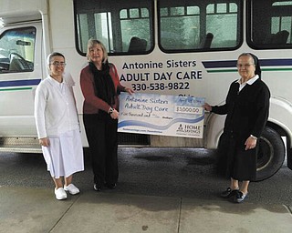SPECIAL TO THE VINDICATOR
The Antonine Sisters Adult Day Care of Canfield recently received a donation of $5,000 from Home Savings Charitable Foundation. The funds will provide transportation for elderly and disabled people to and from their homes and the care center. From left are Sister Jinane Farah, assistant director of Antonine Sisters Adult Day Care; Linda Jones, branch manager of Home Savings Austintown office; and Sister Marie Madeleine Iskandar, director of the Antonine Sisters Adult Day Care. For information about the day care and its services call 330-538-9822 or visit www.antoninesistersadultdaycare.com.