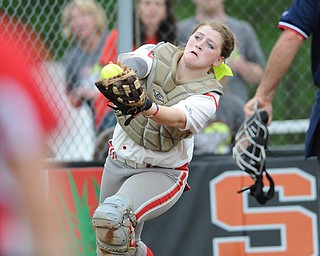 MASSILLON, OHIO - MAY 28, 2014: Catcher Kasey Rininger #10 of LaBrae looks the ball into her glove for the first out in the top of the 5th inning during a OHSAA tournament game at Massillon Washington High School. Manchester won 4-1. (Photo by David Dermer/Youngstown Vindicator)