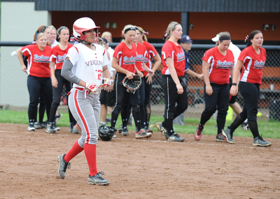 MASSILLON, OHIO - MAY 28, 2014: Base runner Haley Davies #25 of LaBrae fights back tears while walking to the dugout after being the final out of the ball game after a OHSAA tournament game at Massillon Washington High School. Manchester won 4-1. (Photo by David Dermer/Youngstown Vindicator)