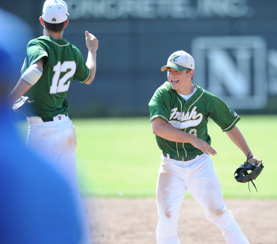 MASSILLON, OHIO - MAY 29, 2014: Infielders Gianni Quattro #12 and Joel Hake #8 of Ursuline celebrate after the game ending double play turned by Hake during a OHSAA tournament game at Massillon Washington High School. Ursuline won 7-5. (Photo by David Dermer/Youngstown Vindicator)