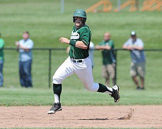 MASSILLON, OHIO - MAY 29, 2014: Base runner Michael Montalbano #23 of Ursuline sprints to second base to complete a RBI double during a OHSAA tournament game at Massillon Washington High School. Ursuline won 7-5. (Photo by David Dermer/Youngstown Vindicator)