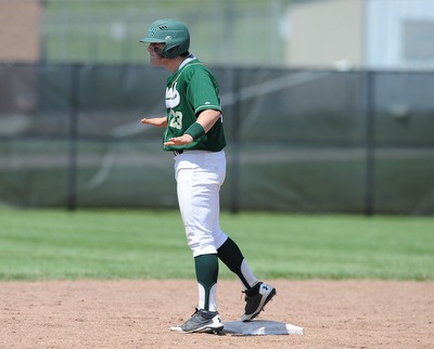 MASSILLON, OHIO - MAY 29, 2014: Base runner Michael Montalbano #23 of Ursuline strikes a pose while standing on second base after hitting a RBI double during a OHSAA tournament game at Massillon Washington High School. Ursuline won 7-5. (Photo by David Dermer/Youngstown Vindicator)