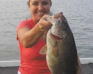 Alicia Mansky caught a small mouth bass at Lake Milton.