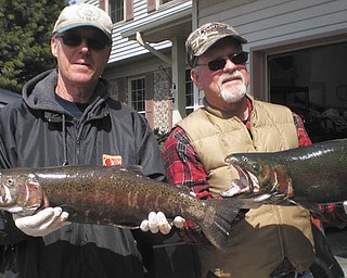 A close-up of Russ Palusak and Steve Horvat at the Grand River in Painesville in 2013.