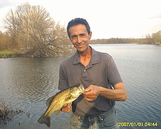Jack Drummond of Austintown submitted this photo of his best friend, Dom Monroe of Boardman, who caught the bass in Mosquito Lake in May this year.