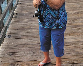 Joan Julian caught the baby catfish on the Naples pier in Florida in March. Photo was taken by Anthony Julian.