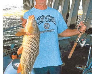 Rich Morar of Youngstown caught a fish at Lake Milton almost as big as he is! His friend, John Koszowski, took the photo, which was submitted by Rich's wife, Debi.