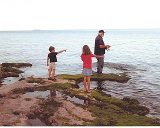 Grandpa Larry Bennett of Greenford was fishing while grandchildren Elise and Ethan Bennett of Westerville did the directing at Put-In-Bay on Lake Erie. Sent by Kathy Bennett of Salem.