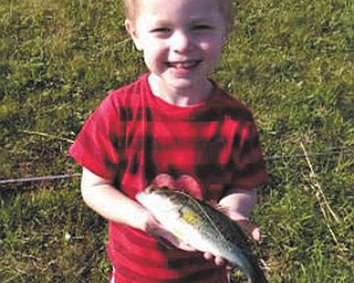 Caden Jones, 3, of New Middletown, was "reelly" proud to bring in this whopper of a bass while fishing for the first time ever on May 19 with his dad, Ryan. The picture was taken at the neighborhood pond and submitted by mom, Angela.