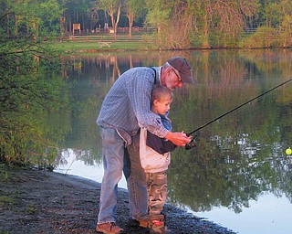 Dan Lynn is teaching his grandson, Nick Holm, how to fish, both live in Youngstown. The picture was taken at Mosquito Creek Lake State Park on May 22. This was Nick's first time fishing. The photo was submitted by TJ Keiran of Youngstown, Nick's uncle.