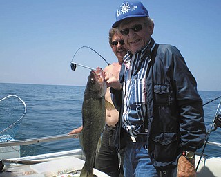 Eddie Krishko of Boardman caught this walleye at Lake Erie. Submitted by Pete Zatvarnicky.