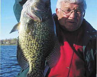 Mike Kadilak: Here’s an image of Mike Kadilak of Boardman with an 18-inch Crappie!