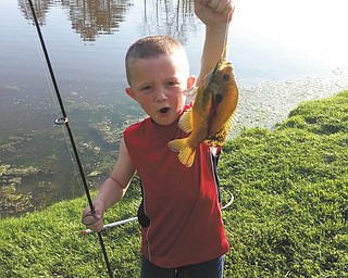 Little Anthony Pastella loves to fish and says ÒWowÓ look what I caught this time! Sent in by great-grandma Millie Valentino.