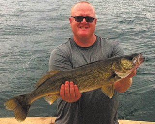 Willi Colbert of Salem, caught this beautiful walleye at Geneva Marina.